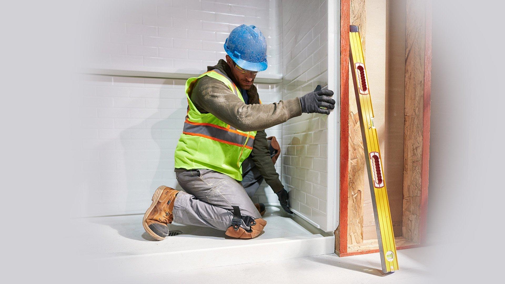 Contractor installing a shower